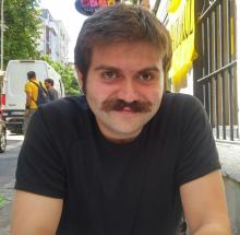 Sarp Kurgan headshot